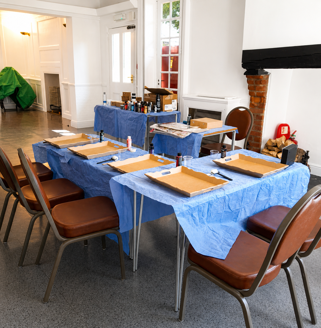A workshop room prepared with craft materials
