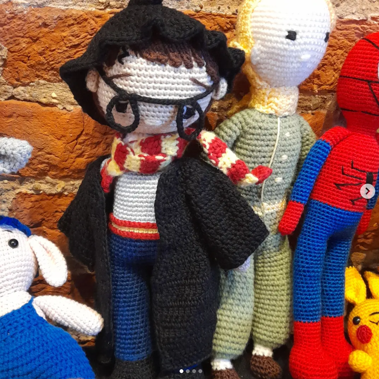 Close-up of handmade crochet character dolls