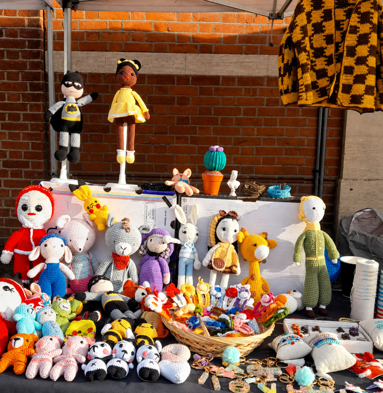 A colourful table of handmade crochet characters